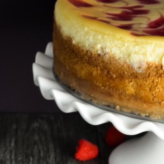 Tall Creamy Cheesecake With Raspberry Swirl