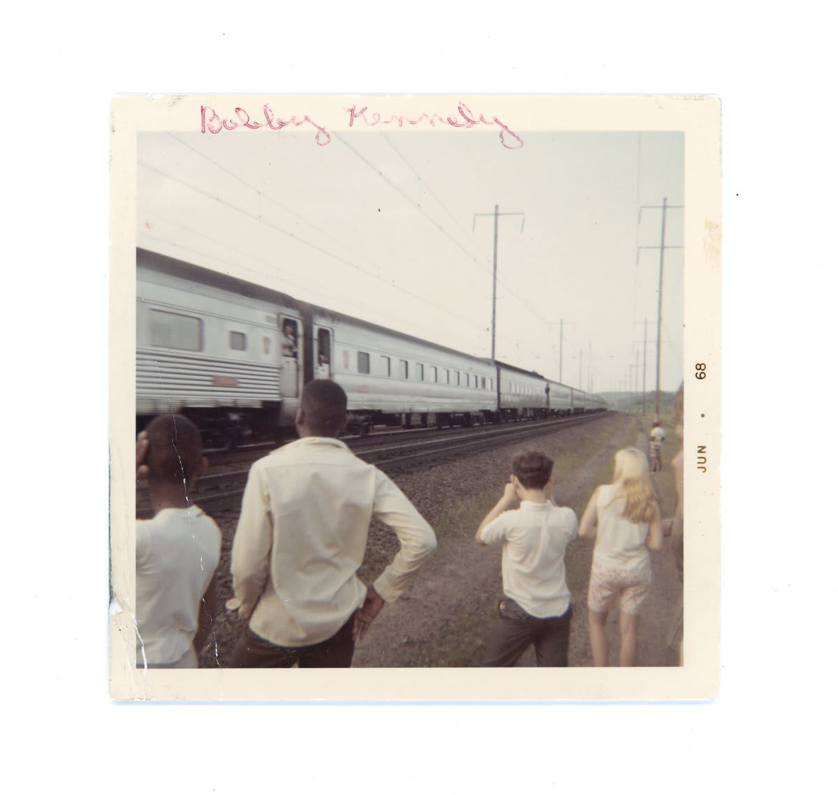 "Robert F. Kennedy Funeral Train, The People’s View" is a photobook by Rein Jelle Terpstra, who reconstructed the story of the people who paid tribute to the 21-car train carrying the body of Robert F. Kennedy from New York to Washington, DC, 50 years ago