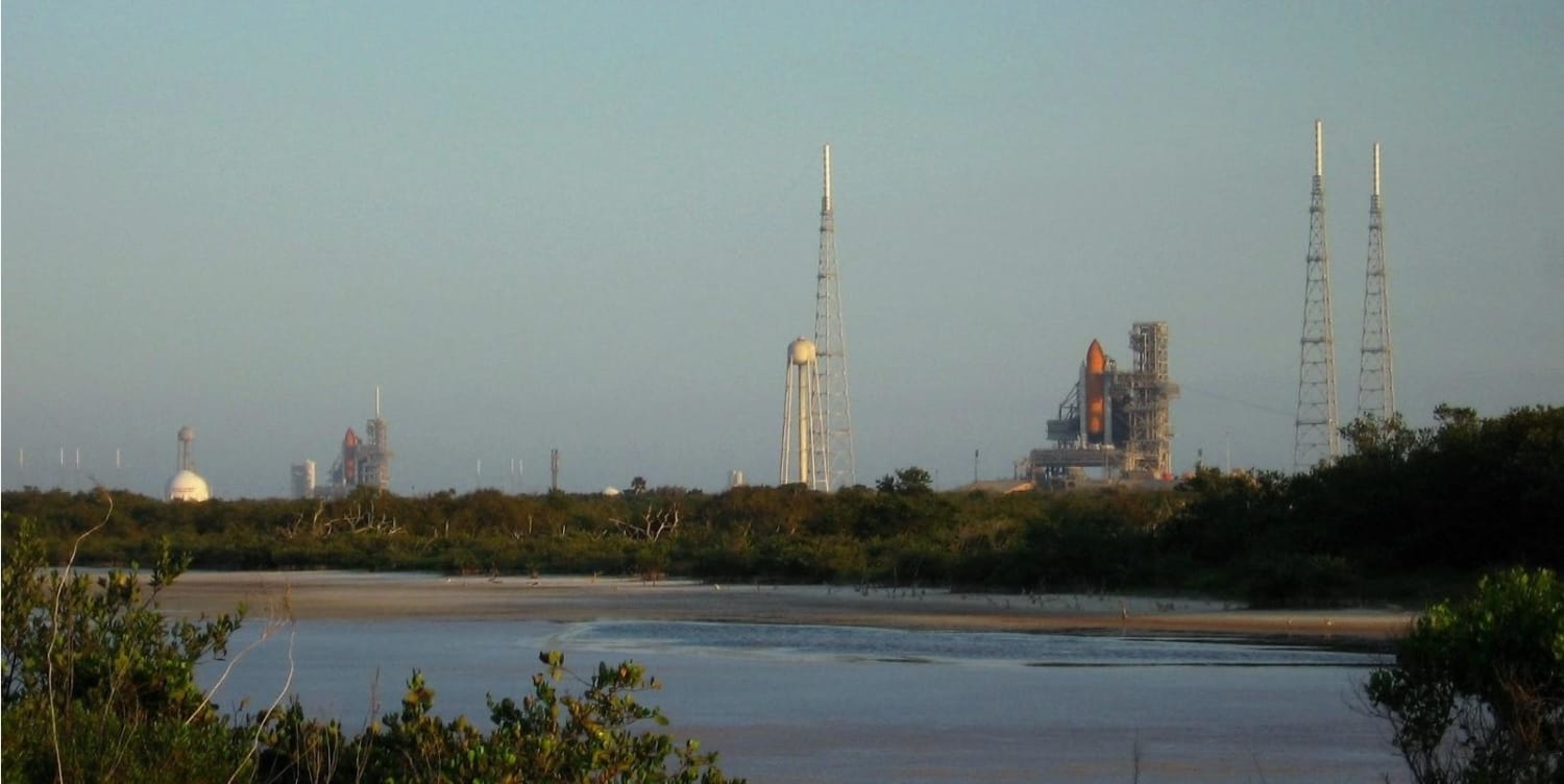 Two space shuttles (Atlantis and Endeavour) on both launch pads for the last time. Photo taken in early May 2009 by my dad and edited by me.