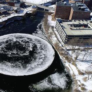 Odd Perfect Ice Disc Looks Like The Moon, Crop Circles Or Some Alien Creation