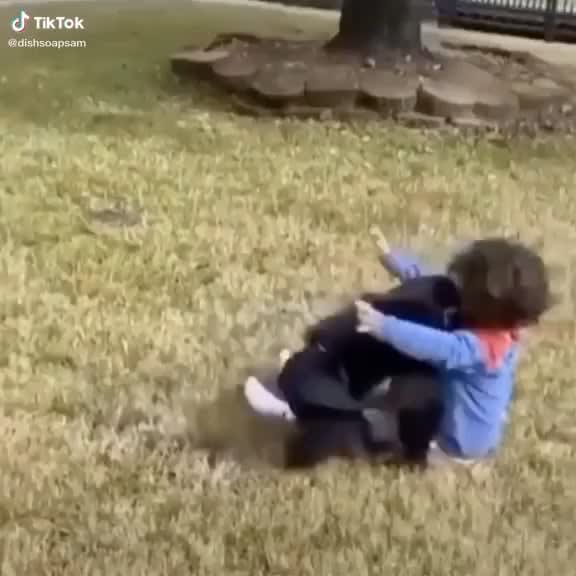 Boy makes friends with monkey