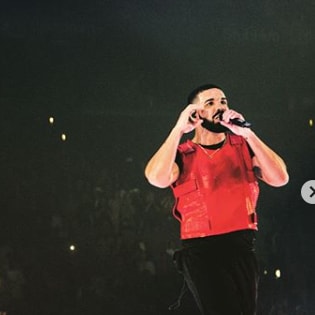Drake officially ends his beef with Chris Brown, brings the singer on stage at his concert in LA (Photos)