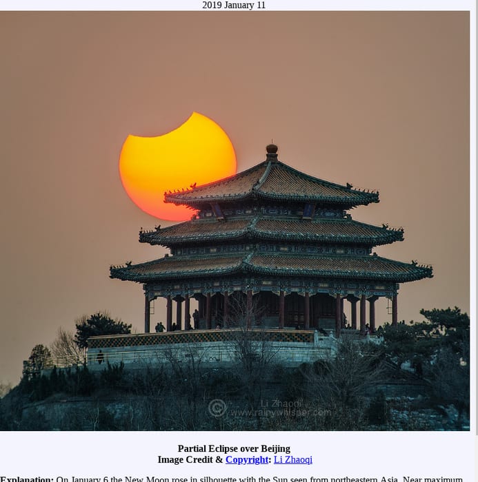 APOD: 2019 January 11 - Partial Eclipse over Beijing