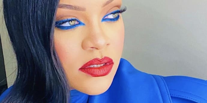 Rihanna Looks Positively Regal in Royal Blue Eyeliner and a Matching Trench Coat