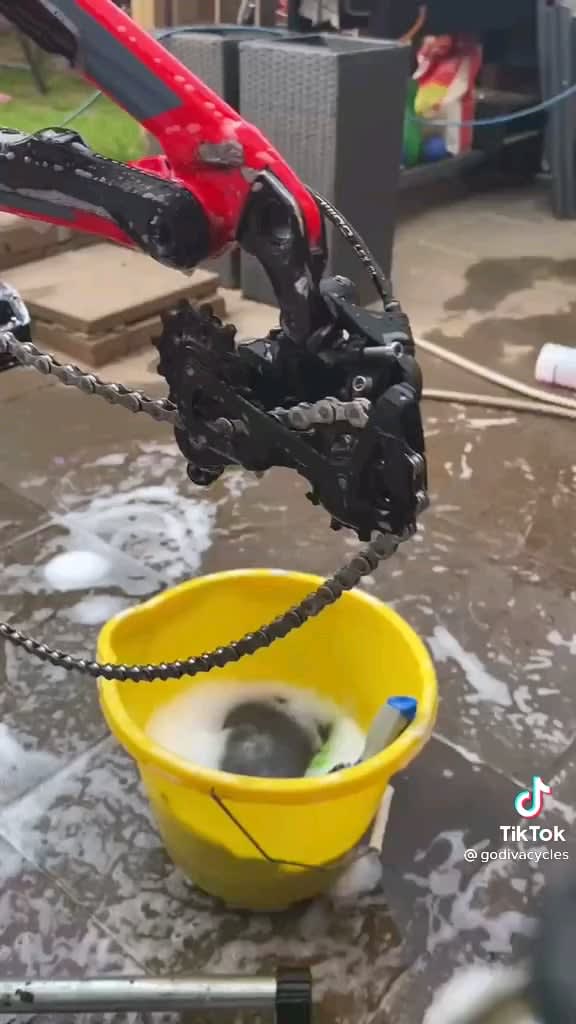 Cleaning a bike.