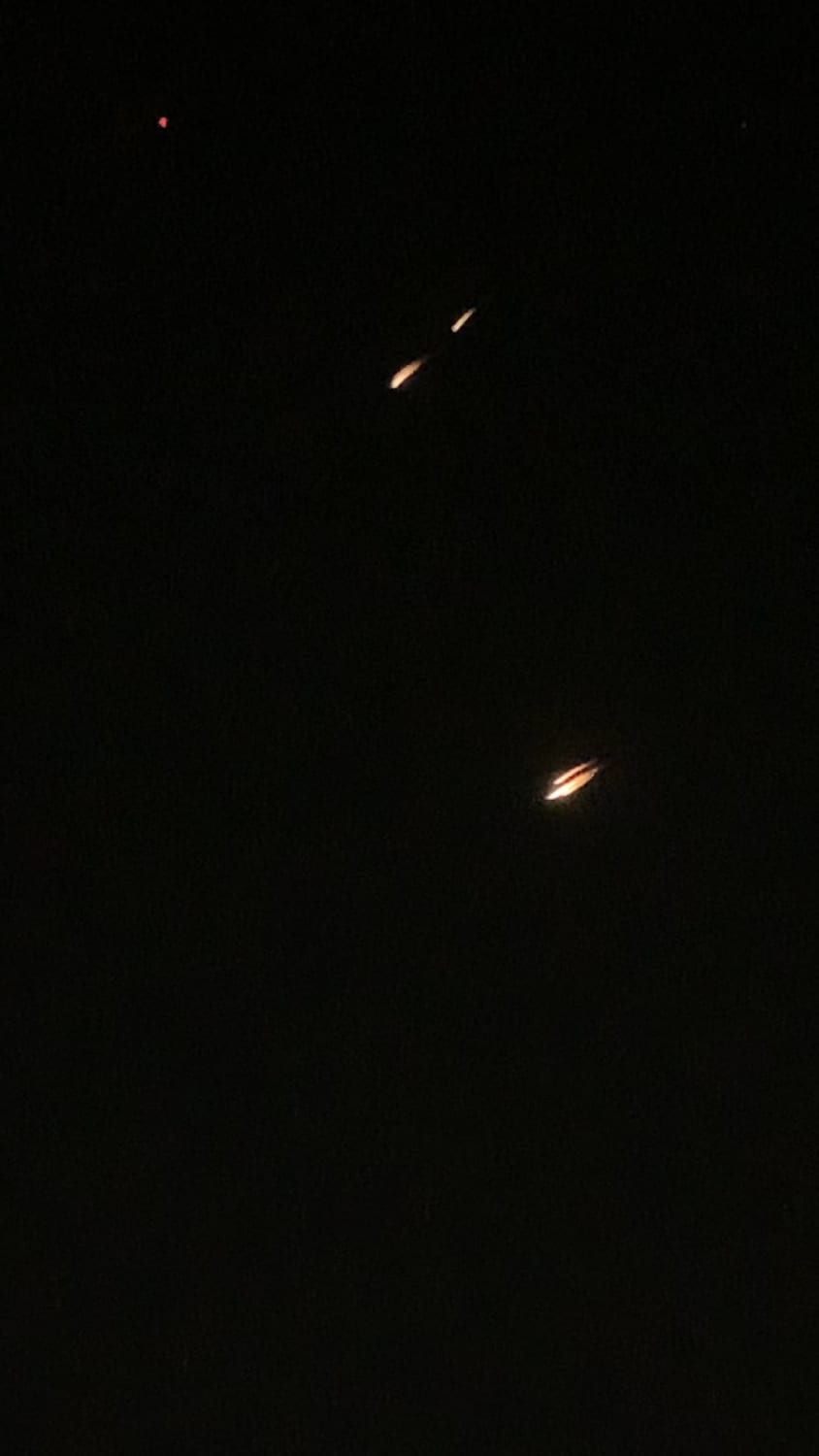 Captured tonight. Thought they were meteors until they paused