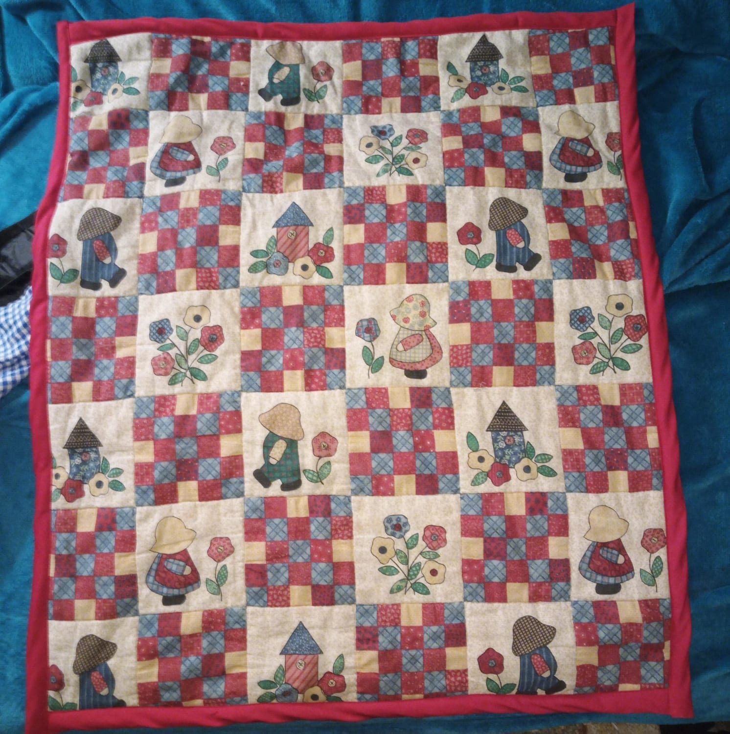 I trimmed all the destroyed parts off my baby quilt and put a new border on. I'm not very experienced, but I'm happy with it.