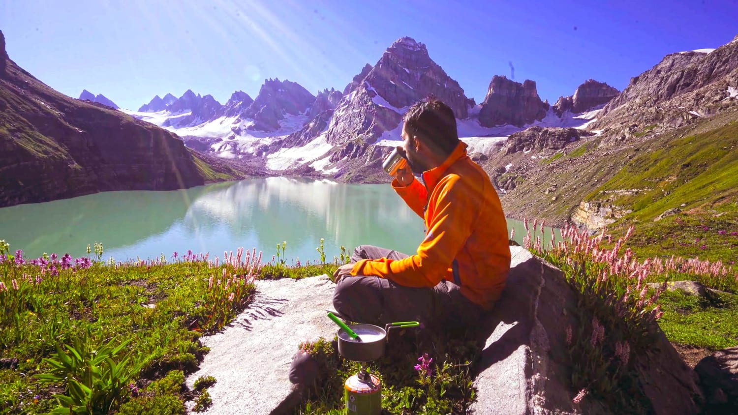 A tranquil high-altitude lake surrounded by wildflower meadows & towering mountains. But most importantly, freshly brewed tea!