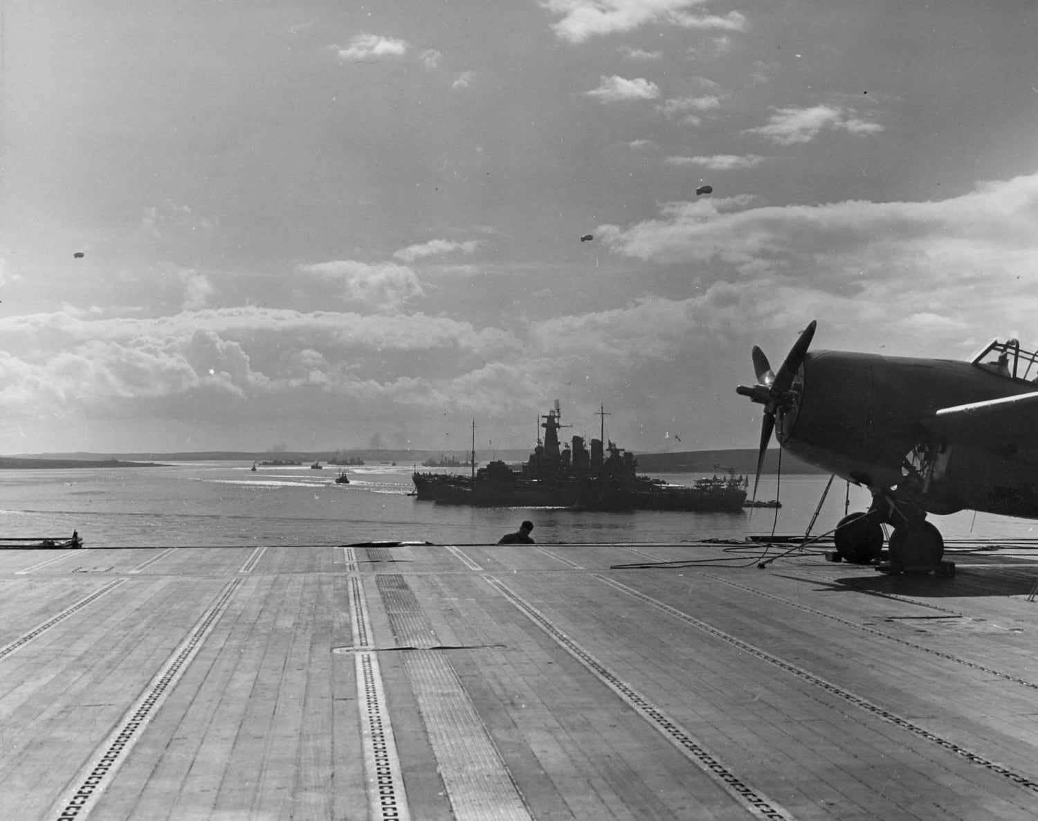 American battleship USS Washington (BB-56) at Scapa Flow in Scotland on 4 April, 1942. The photo was taken from the flight deck of the aircraft carrier USS Wasp (CV-7) during the operation to deliver aircraft from the British Isles to Malta.