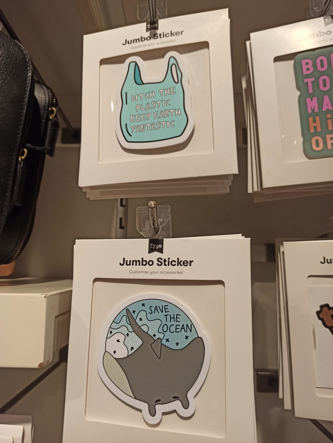 Stickers advocating against plastic waste... made of plastic and in plastic packaging
