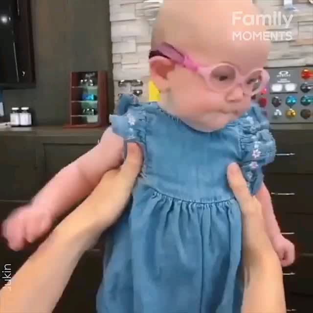 Baby girl sees Mom for the first time after wearing glasses