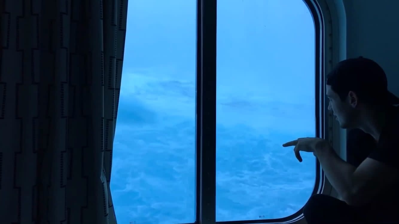 A Cruise ship caught in huge waves and 120MPH winds. View from the third deck.
