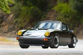Why are yellow lights popular in old 911s? Do they serve a purpose…good in fog?