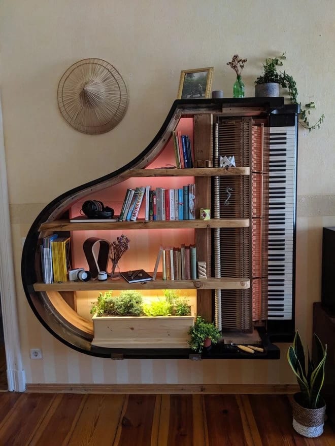 A bookshelf made out of a piano