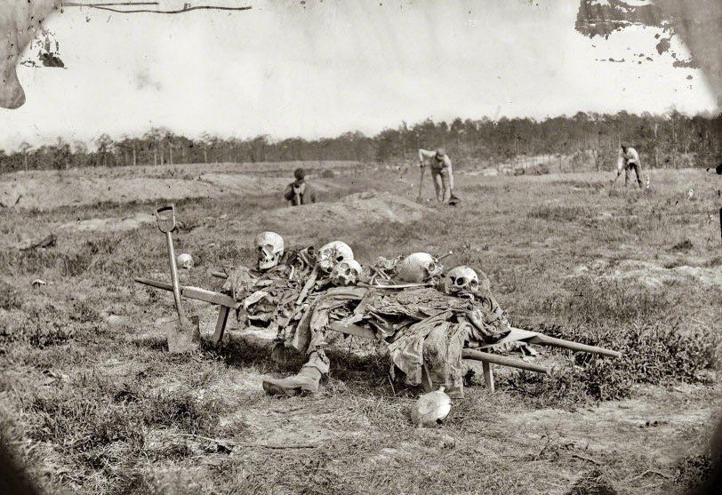 Collecting remains of dead on the battlefield after the war, April 1865, Cold Harbor, Virginia.