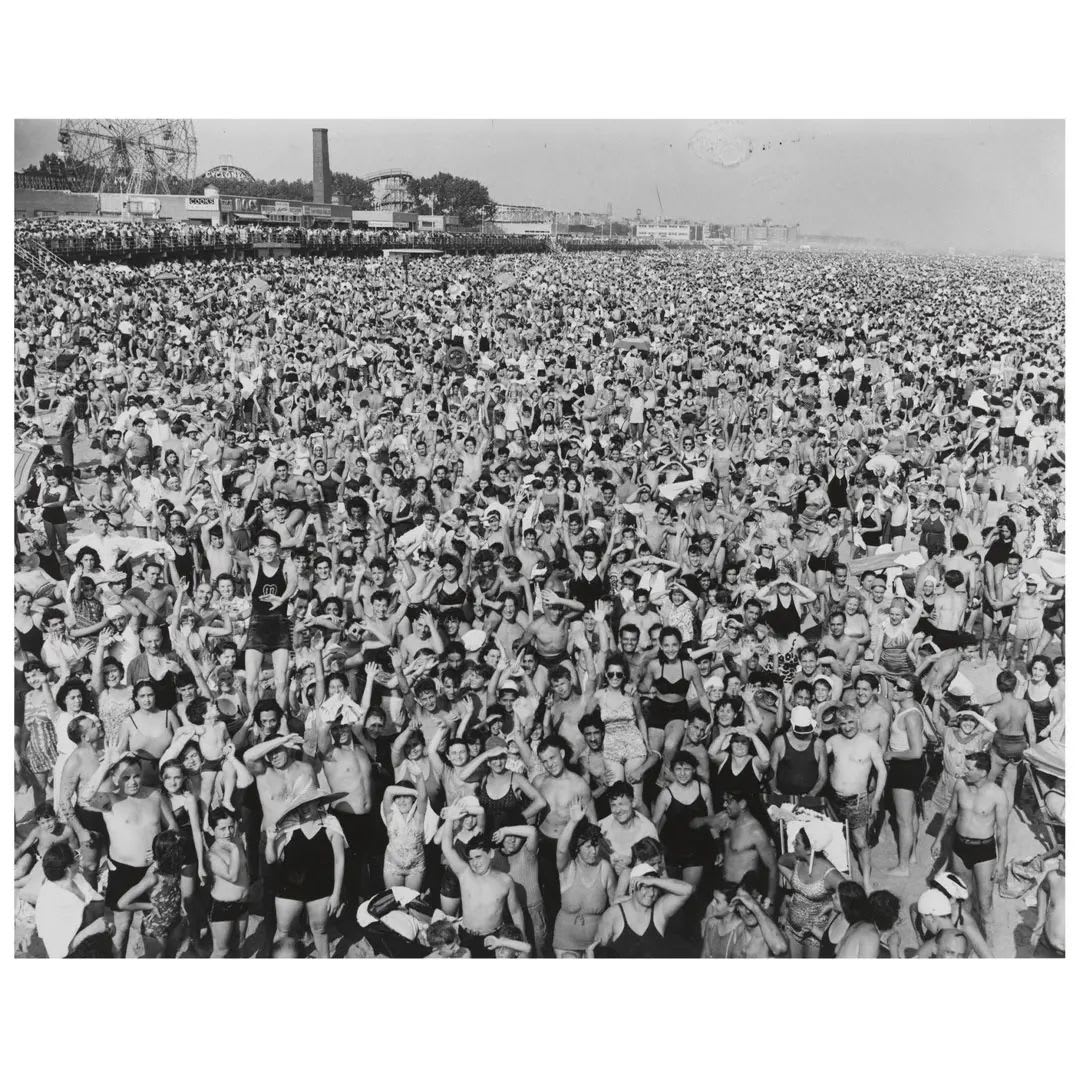 When you drive 2 hours to get to the beach hoping no one else had the same idea and - 📸 Photograph by Weegee, 'Coney Island', 1940