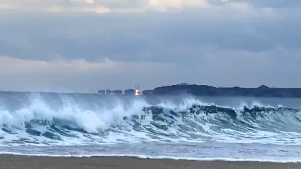 Japan's H-2A rocket lifting off from the Tanegashima Space Center. Video taken by a surfer.