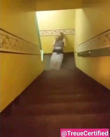 Sliding down the stairs in a plastic box