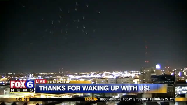 Milwaukee news channel captured a mysterious light show over the city live during their show Tuesday morning. (2/27/18)