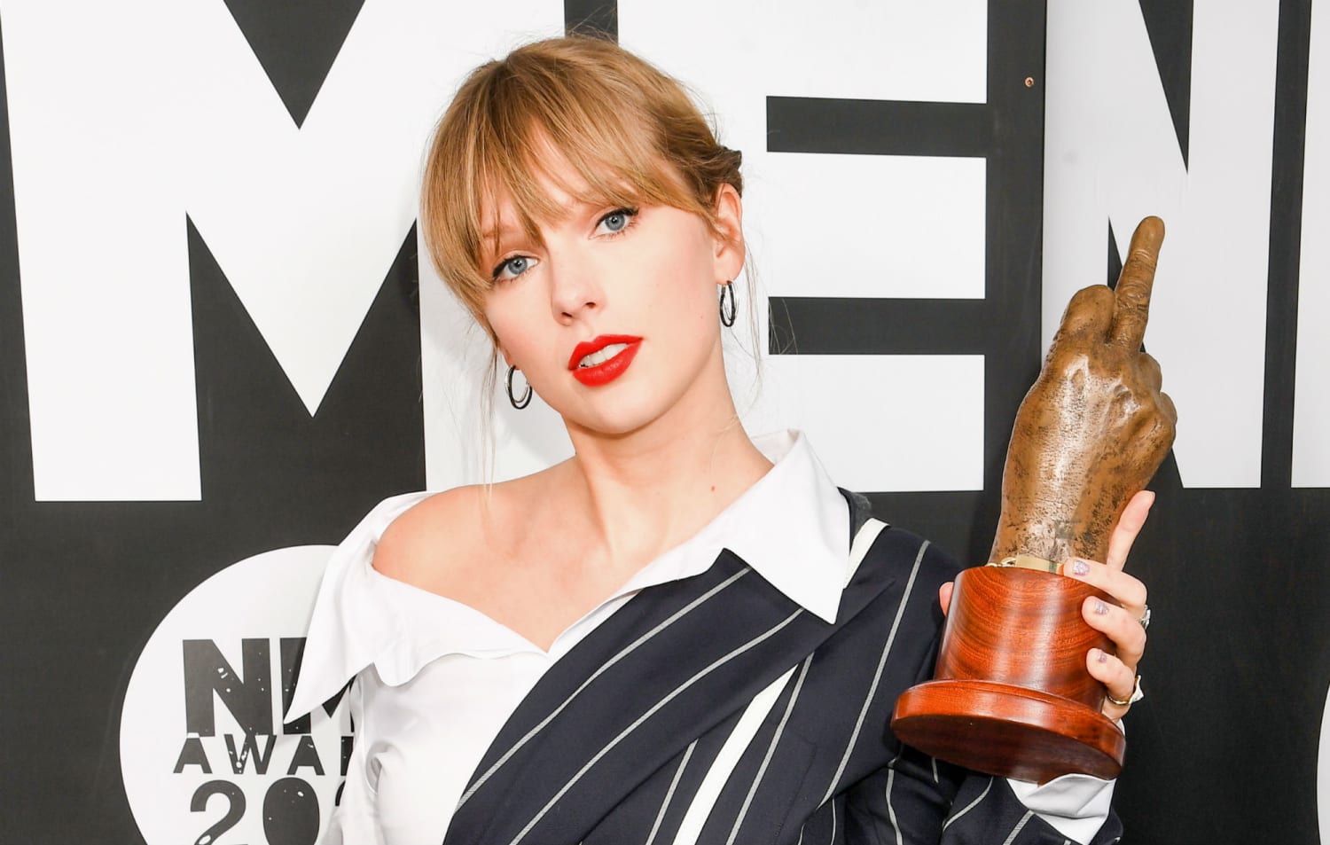 Taylor Swift says re-recording old music is "an amazing adventure"