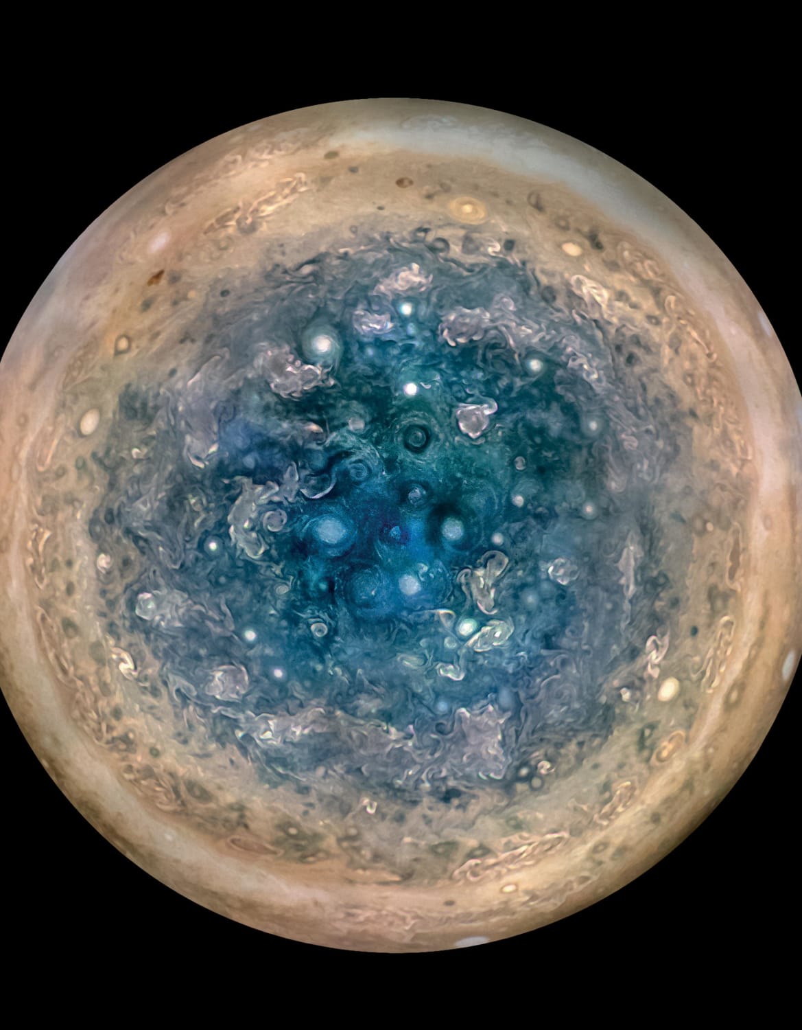 Jupiter’s south pole, as seen by NASA’s Juno spacecraft from an altitude of 32,000 miles. The oval features are cyclones, up to 600 miles in diameter.