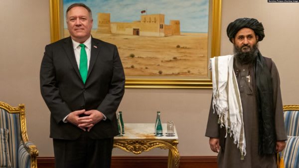 Former Secretary of State Mike Pompeo with Taliban co-founder Mullah Abdul Ghani Baradar Sept. 2020
