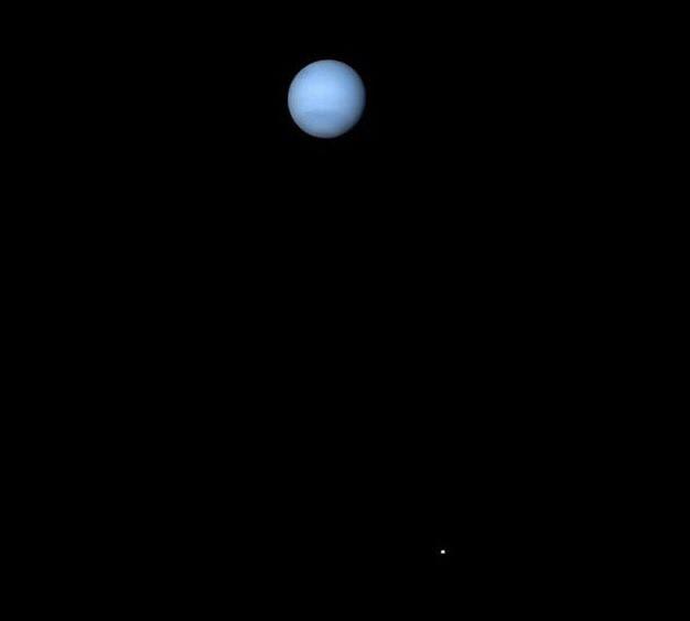 Neptune and triton captured by voyager 2, 1989