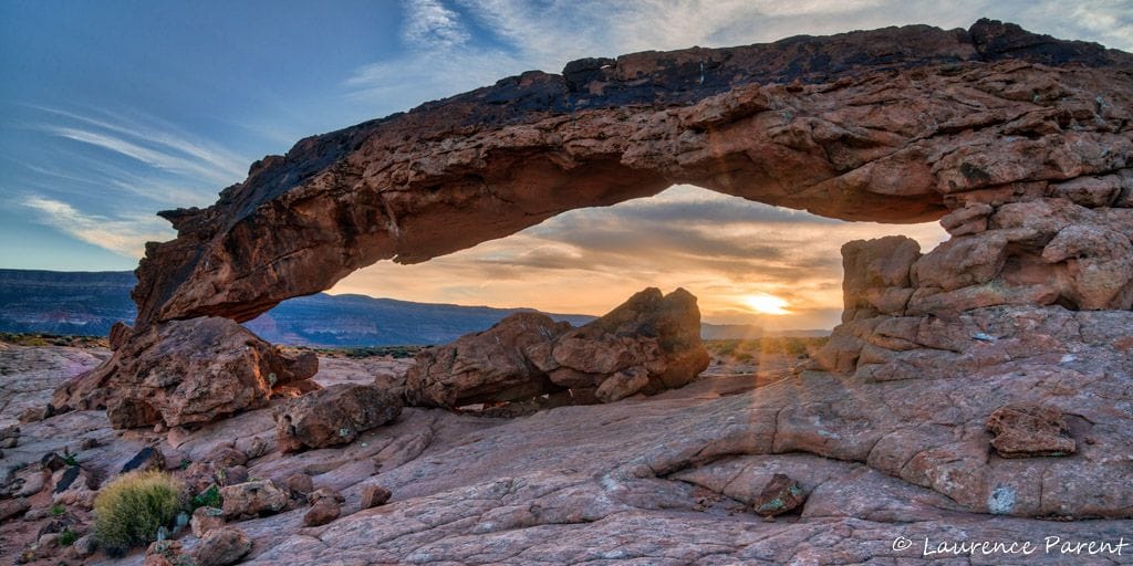 Photograph slot canyons, hoodoos, terraces, arches, and waterfalls in