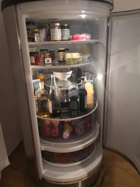 Refrigerator with a Lazy Susan built in.