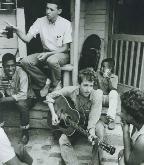 Bob Dylan playing in Greenwood, Mississippi, 1963.