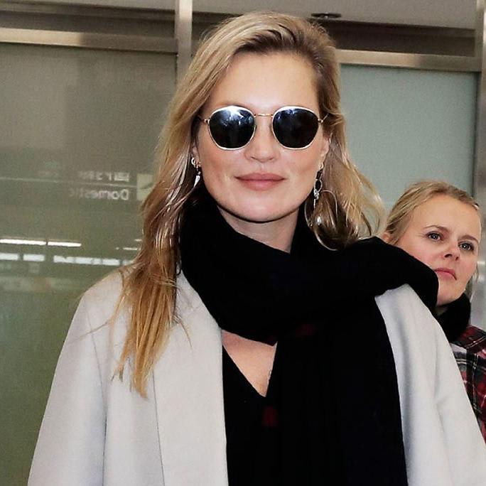 Kate Moss Breezes Into Tokyo Wearing a Supermodel-Worthy Duster