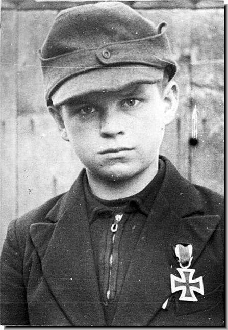 Nazi Germany was fighting with boys in the last days. This boy was given the Iron Cross. 1945.