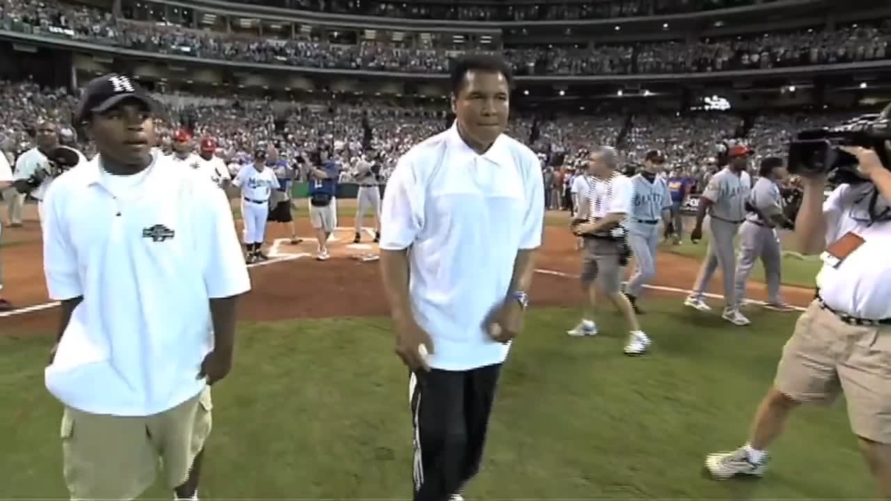 Muhammad Ali doing his famous jab uppercut combo just before throwing the first pitch of the 2004 MLB All-Star Game