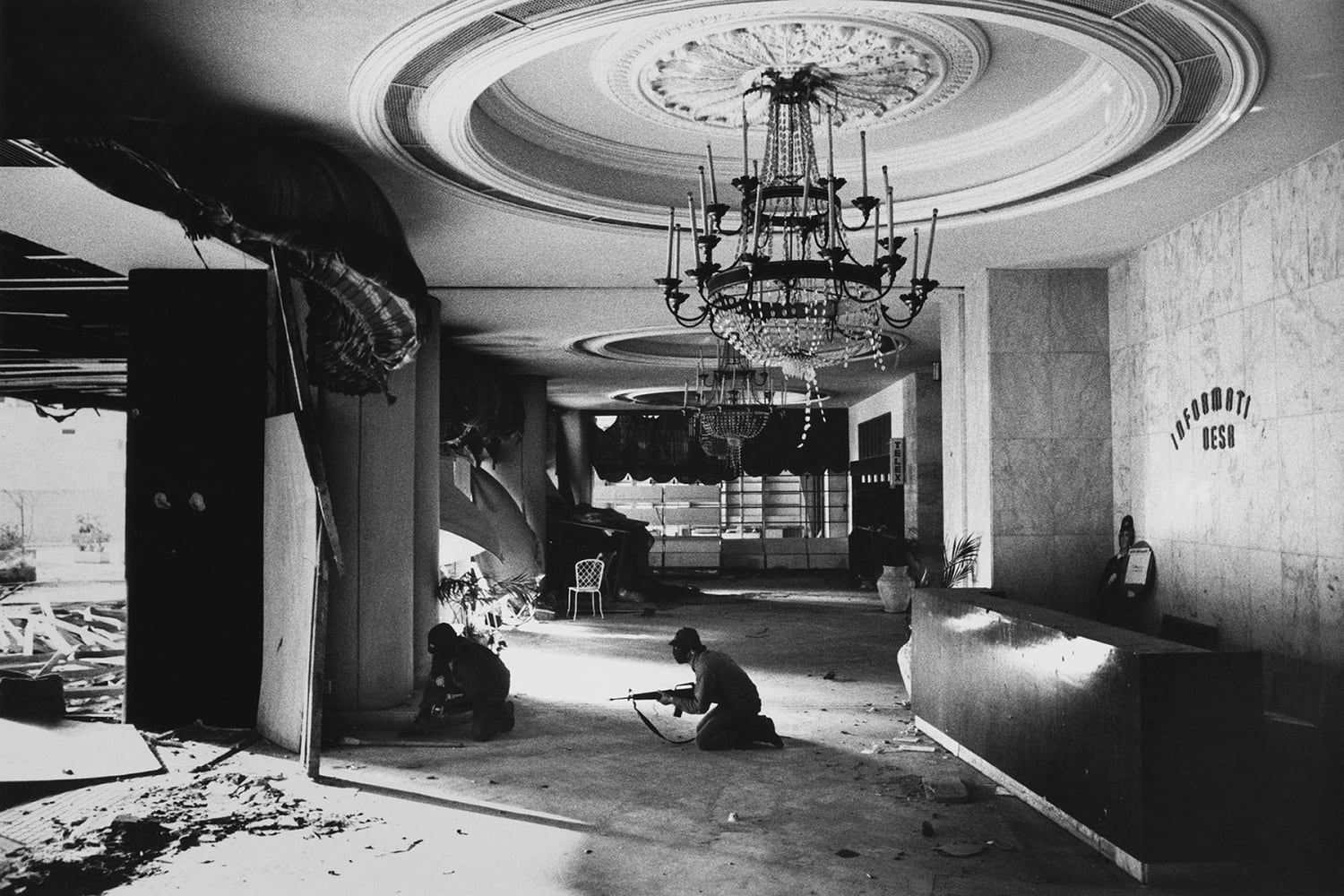 Christian gunmen in the foyer of the Holiday Inn in downtown Beirut, battling with Palestinians in the adjacent hotel during the Lebanese Civil War, 1976
