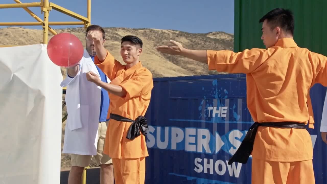 Shaolin Monk throwing a Needle Through Glass in Super Slow Motion