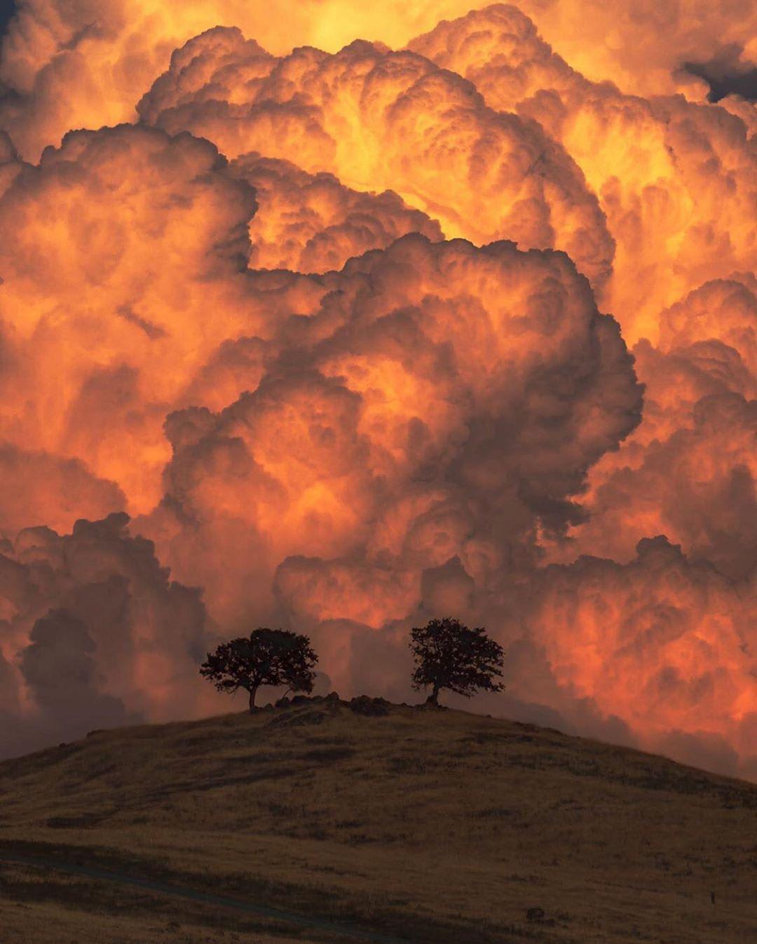 Towering thunder clouds that were captured during a sunset created the most amazing, yet haunting effect.