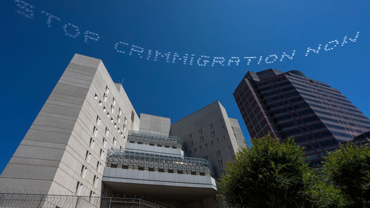 Artists Enlist Skywriting Planes To Expose The ICE Detention Crisis In Our Backyards