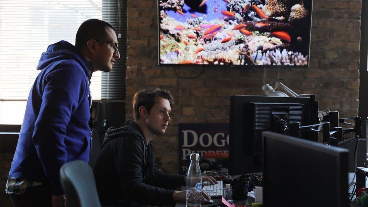 Hey grads: Chicago's tech job market is sizzling. Here's how 3 workers landed spots in cybersecurity, software developing and IT.
