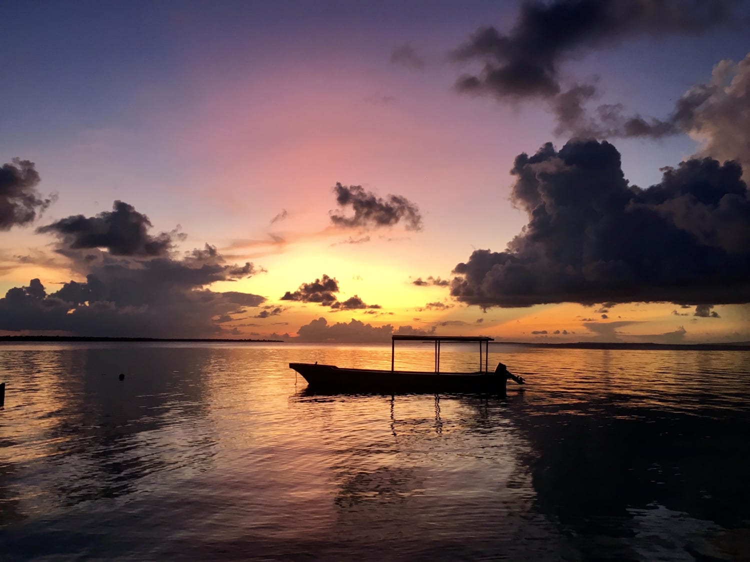 Sunset at Palau Hoga, Indonesia (Photo credit to Katuk Patah)