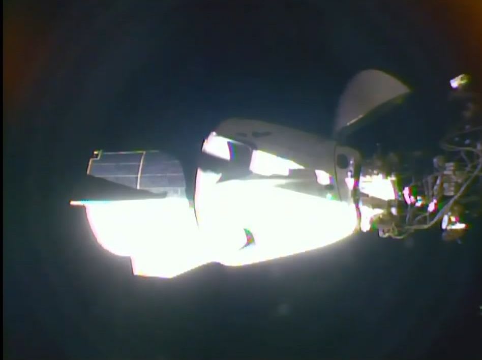 SpaceX's 1st Crew Dragon with astronauts docks at space station in historic rendezvous