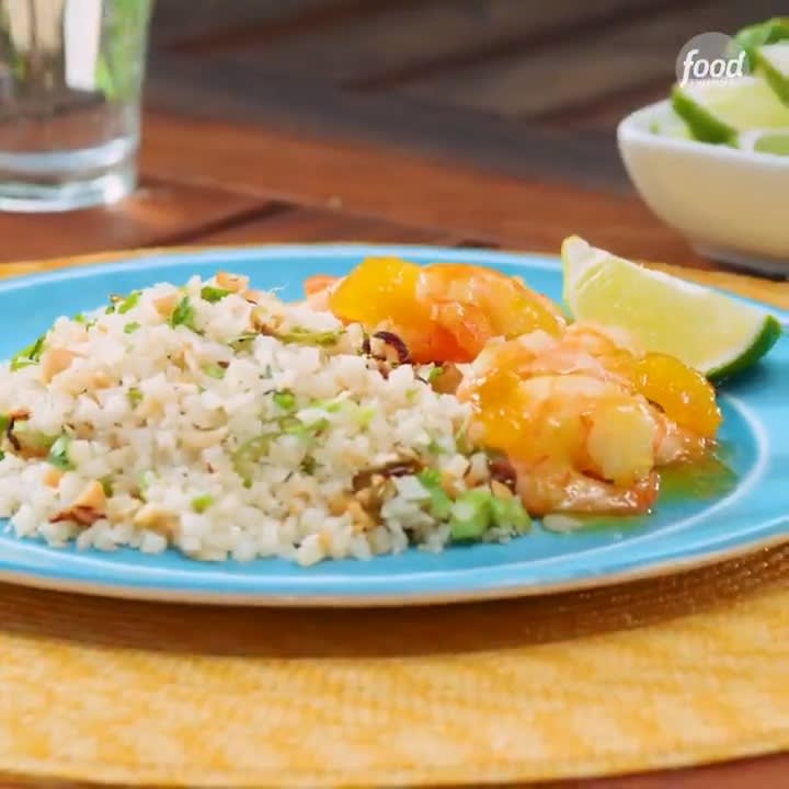 Mango-Glazed Shrimp with Riced Cauliflower ACTUALLY tastes like a tropical vacation! Get the recipe: