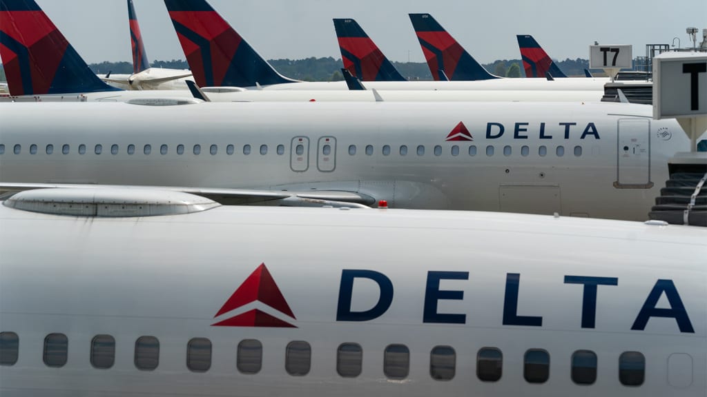 Off-duty Delta flight attendant allegedly choked crew member, claimed to be seated next to a terrorist before being subdued, police report says
