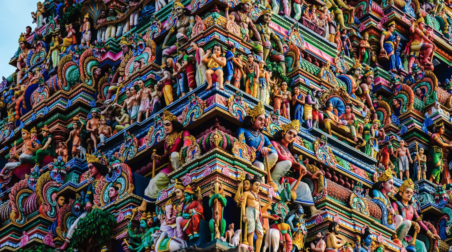 Detail of the main gopuram of Kapaleeshwarar Temple, Mylapore, India. The origins of this temple can be traced back to the 7th century AD. The current structure was built in the late 16th or early 17th century after the older temple was demolished by Portuguese settlers in 1566.