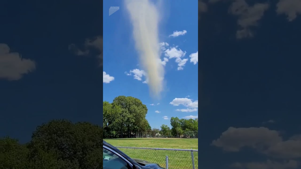 Dust Devil Forms at Playground and Disintegrates as it Flies in the Sky - 1197677