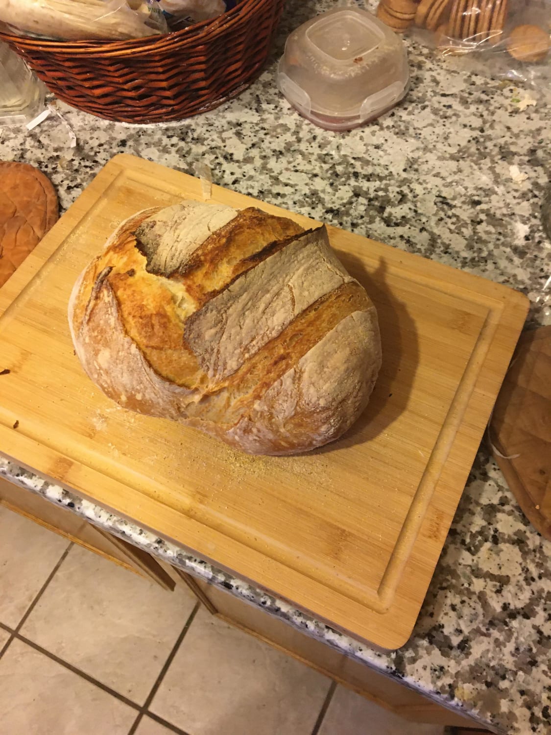 Terrible at photography but I made a rustic loaf I’m pretty happy with