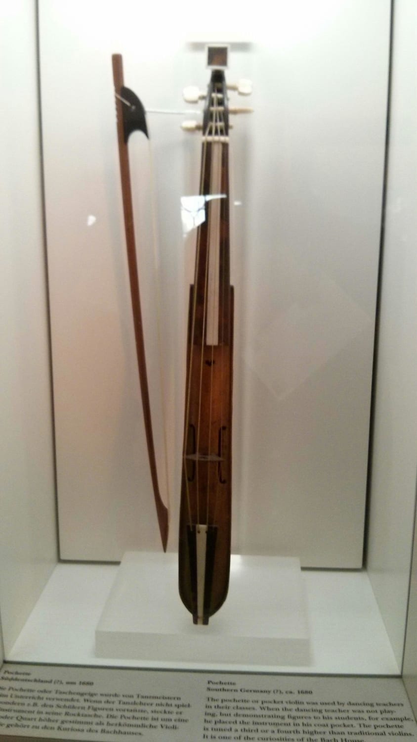 The Pochette (1680) displayed in Bachhaus, Eisenach, Germany. Pochette (pocket violin) was used by dancing teachers to keep violin in reach while demonstrating figures and movements.