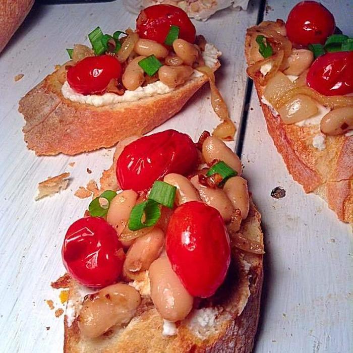 Cherry tomatoes and white beans toast