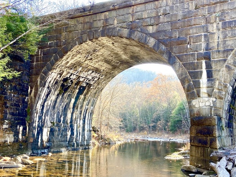 Hike through railway history on the gorgeous Keystone Arch Bridges hiking trail.