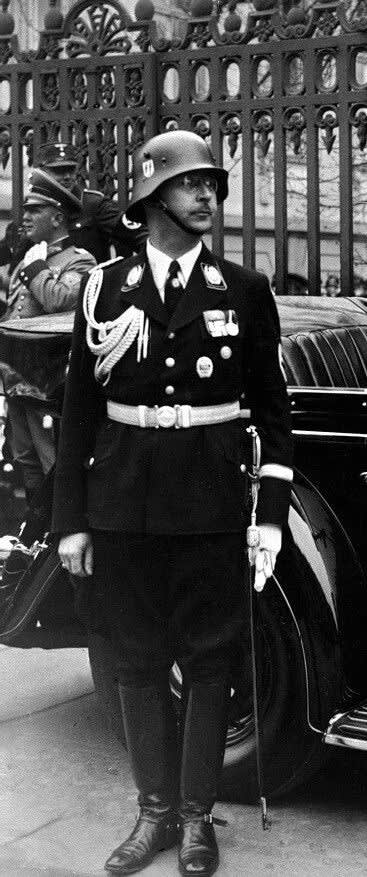 Heinrich Himmler Wearing the Decorated SS Uniform along with the duckbill Helmet at Hitler's 50th Birthday , 20 April 1939 ,