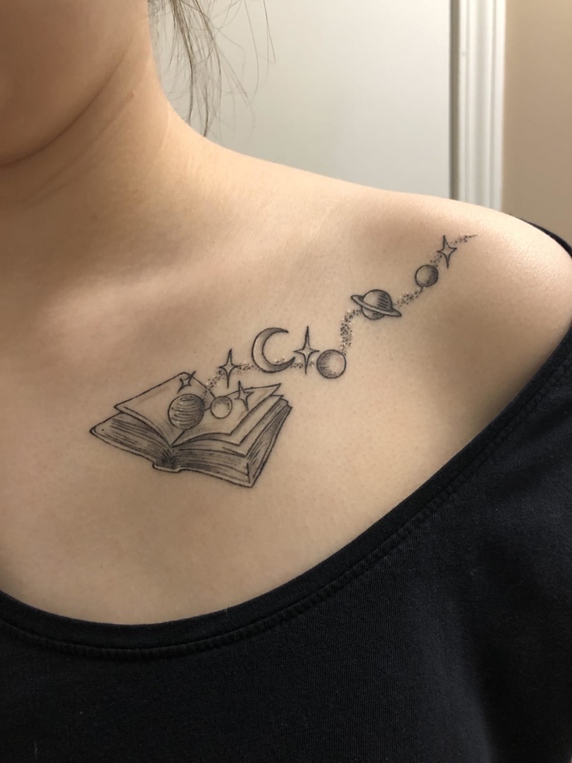 Book with space done by Aubry Claire at Empryrean Tattoo in Marietta GA. Done in January, healed pic from February